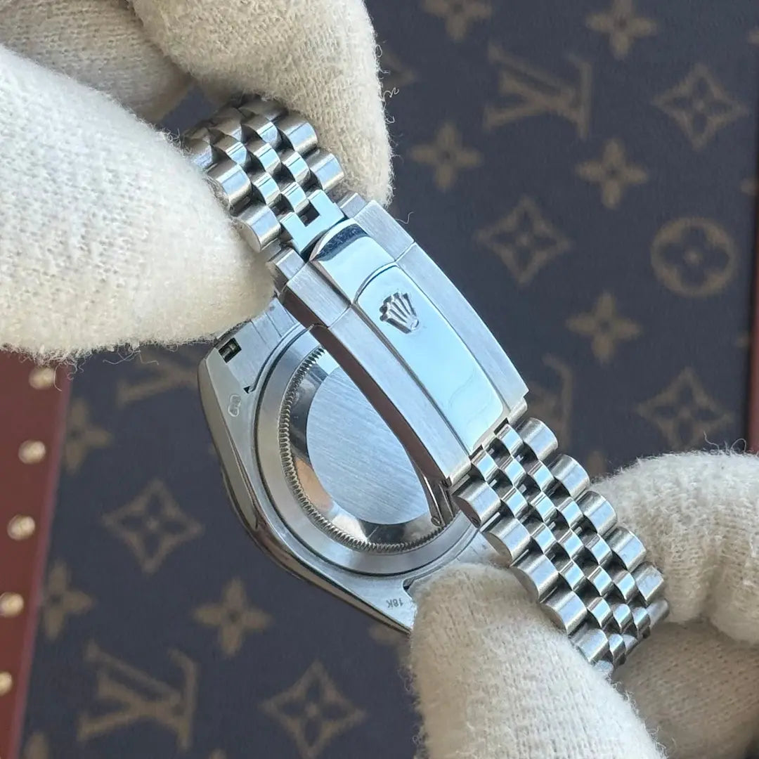 Detalle de maquinaria auténtica Datejust Oystersteel Kronos Relojes