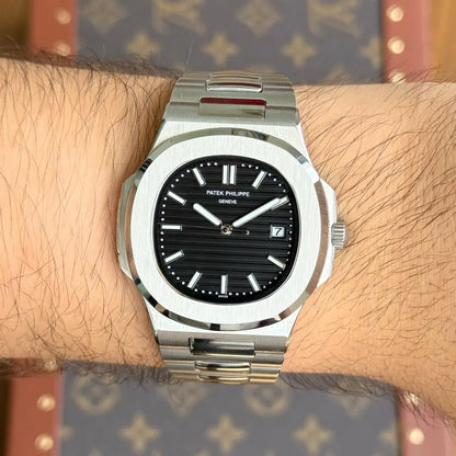 Reloj Nautilus Steel esfera negra maquinaria auténtica Kronos acero inoxidable