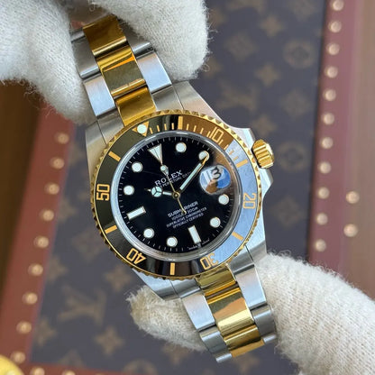 Submariner Rolesor acero y oro Rolesor Kronos Relojes detalle bisel negro